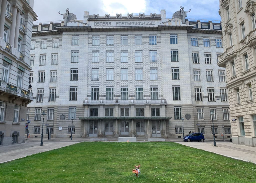 Photo of the front of the Postsparkasse building in Vienna