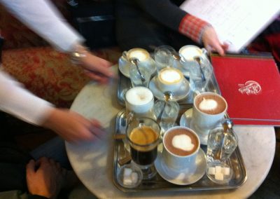 Photo of coffee being brought to the table at Cafe Sperl in Vienna