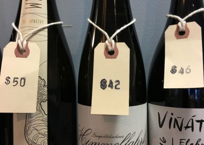 Photo of wine bottles with price tags